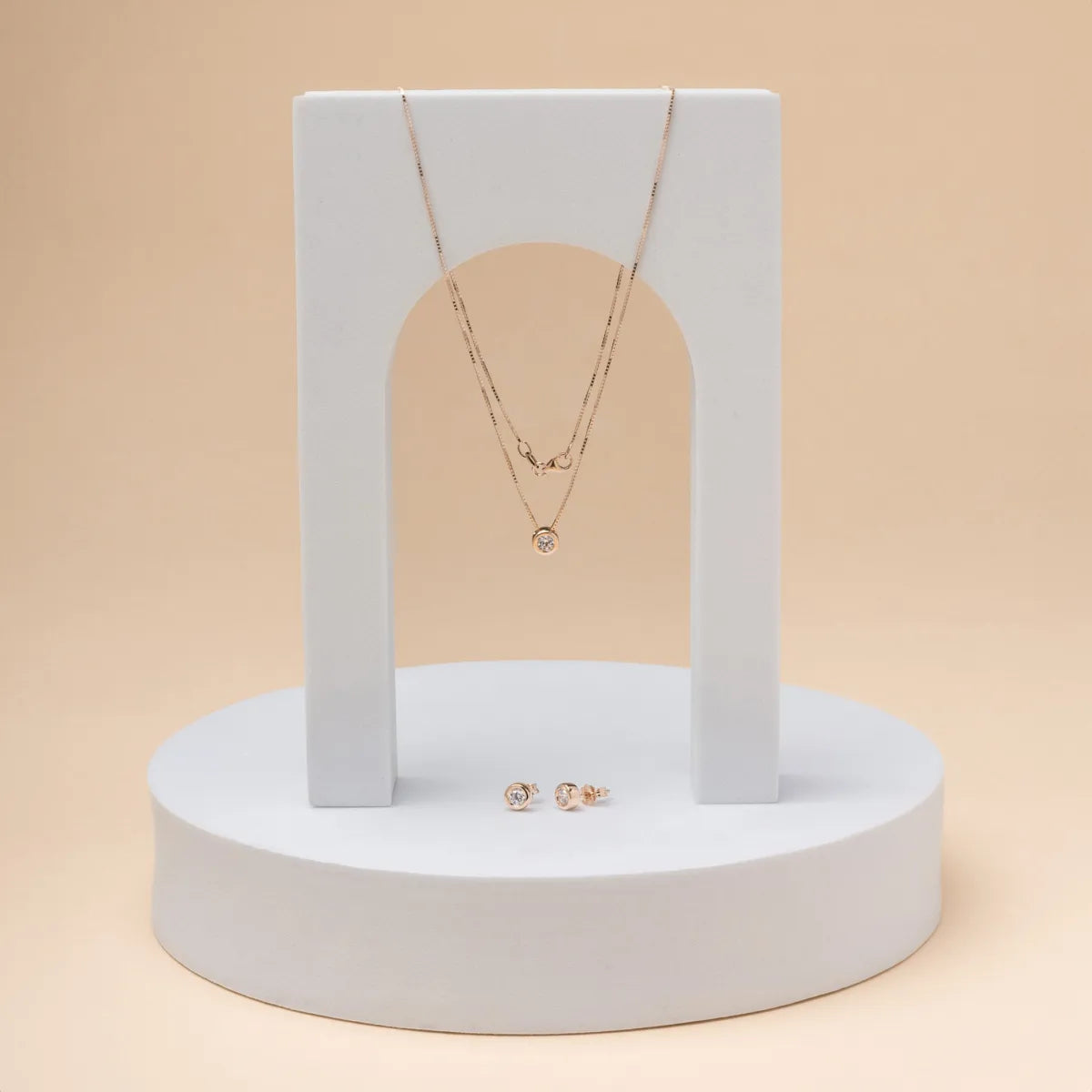 14ct Rose gold solitare set with cubic zirconia: necklace and earrings